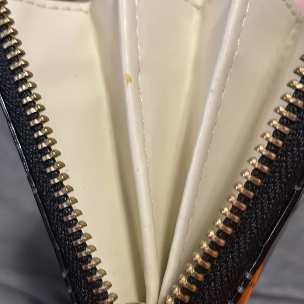 Kate Spade perforated Neda zip around wallet